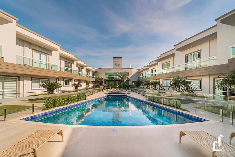 Apartamento pé na areia em Canto Grande | Petit Village